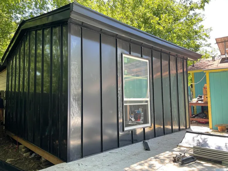 Black standing seam metal wall panels for Roof Inspection in Federal Way